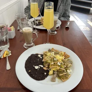 Chilaquiles Verde with an orange mimosa and latte
