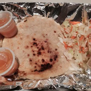 a tortilla and coleslaw