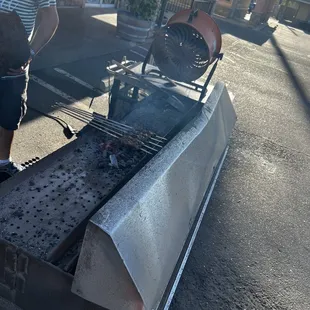 Outdoor charcoal grill