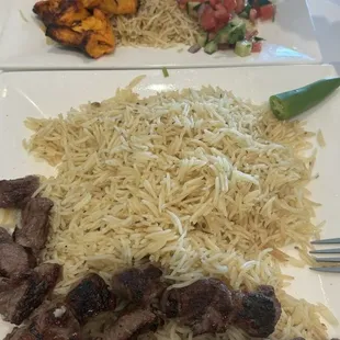 Chicken and lamb kebobs with rice