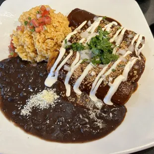 Queso Frito Enchilada with mole sauce. Options are also red or green sauce.
