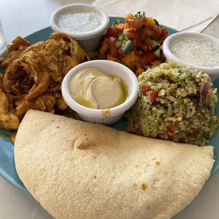 Chicken Roast Chicken (Shawarma), Tabbouleh - Israeli Salad - Hummus - tzatziki  The tzatziki was the consistency of dill ranch dressing.