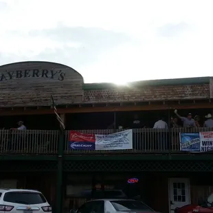 people on the balcony of the building
