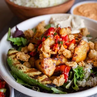 a bowl of chicken and rice
