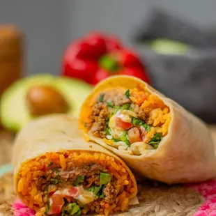 12-inch size burrito with a base of rice and beans 

-Choose your meat
-Choose you toppings