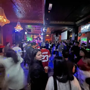 a crowd of people at a party