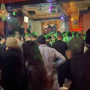 a crowd of people at a party