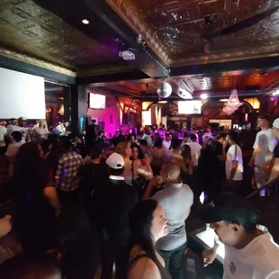 a crowd of people at a party