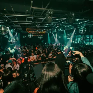 a crowd of people at a nightclub