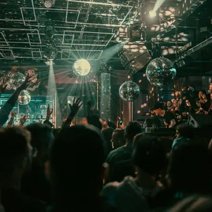 a crowd of people at a nightclub