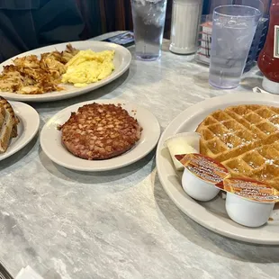 Waffle, corned beef hash, hashbrowns, rye toast