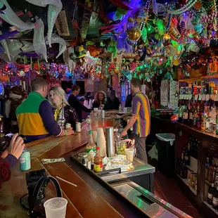 a woman sitting at the bar