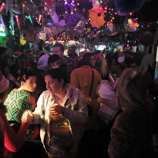 a crowd of people at a party