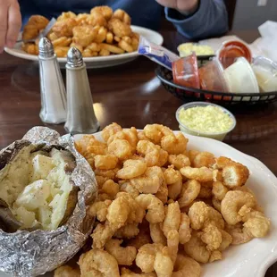 Lunch special was $9.95 and I got all this shrimp, baked potato, slaw and 3 large hushpuppies
