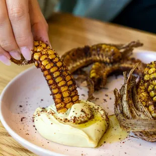 Corn Ribs 
morita &amp; sumac dust, lime leaf aioli