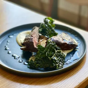 Flat Iron Steak With madeira truffle sauce, jerusalem artichokes, pear &amp; parsnip puree, kale and horseradish oil