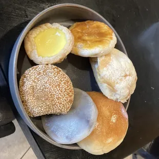 $9.20 of pastries. Clockwise: Egg tart, honey cake, almond butter bun, bbq pork bun, fried red bean cake, sesame ball