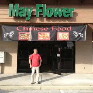 a man standing in front of the entrance