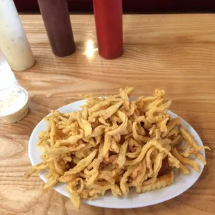 Huge serving Of golden goodness Clam strips. This is the smaller size.