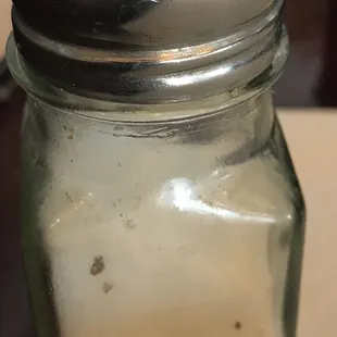 The dirty salt with particles in it