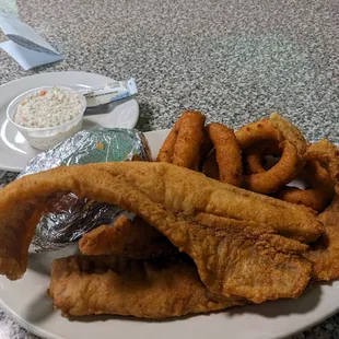 Tuesday All-day Special - Fried Whitefish w/slaw, hushpuppy rings, baked potato, (sleeve of sour cream for potato.)