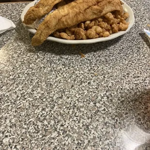 Fried Trout plate with baked potato , coleslaw&amp; shrimp combo( comes with one piece of fish- any more a charge