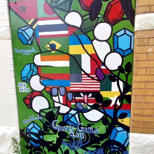 Gwen's girls mural on Sampsonia Way side of building