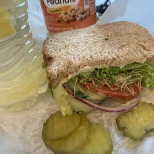a sandwich and pickles