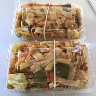 two plastic containers of food