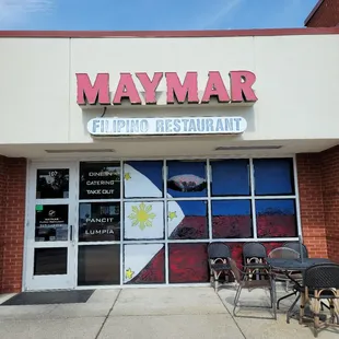 the front entrance of a restaurant