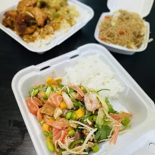 three takeout containers of food