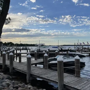 Boats at the dock by patio.