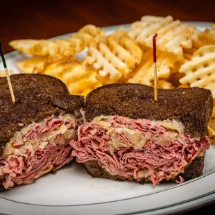 a reuben sandwich and french fries