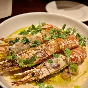 Lagostino app on beans and andouille sausage