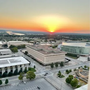 a view of a city at sunset