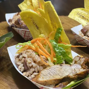 Sample of the freshly crafted Nicaragüense cerdo asado, Gallopinto , and tajadas.