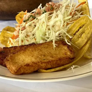 One of our combined side dishes. Tajadas, queso frito and cabbage salad.