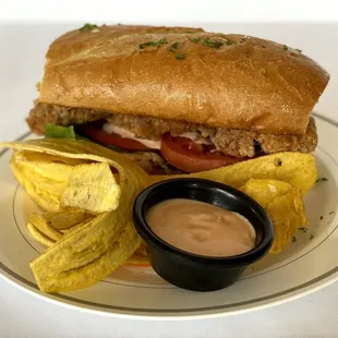 Our chicken sandwich is finger licking good. It comes with your choice of side and mayokechu sauce.