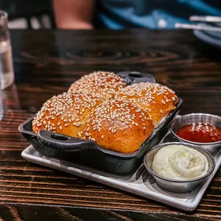 Bread Service / Annatto Sesame Rolls with Cultured Butter and Shellfish Pepper Jam