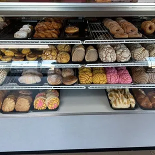 a display case full of donuts