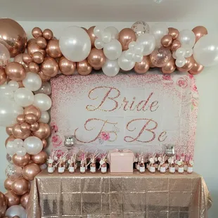 Rose gold balloon garland.