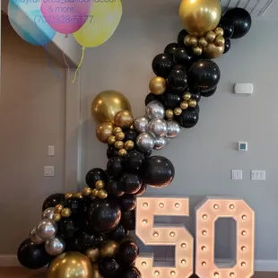 This beautiful extra long balloon Garland is the perfect way to celebrate a #50thbirthday with our marquee numbers
