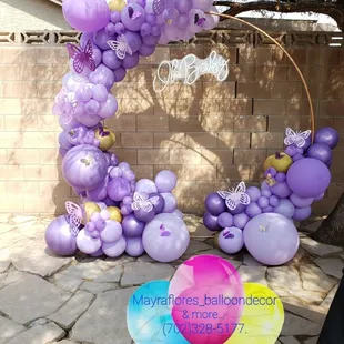 Beautiful baby shower decor in purple shades with butterflies 
Our oh baby sign can be added for a fee