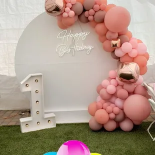 First birthday set up with white circle backdrop in beautiful dusty pink shades 
Our marquee numbers make a perfect addition
