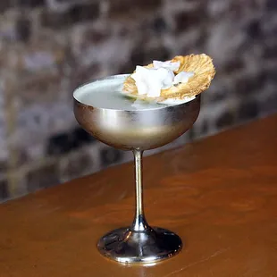 Paga Cocktail with coconut rum, banana liqueur, melon liqueur, pineapple, lime juice