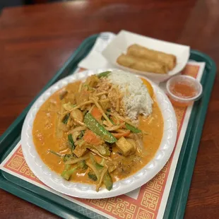 a plate of food on a tray