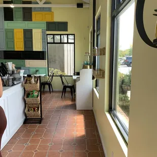 a woman standing in a kitchen