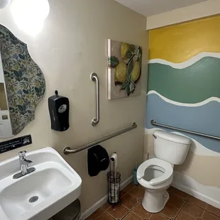 Clean and cute unisex restroom