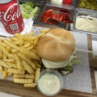 Cheese burger with fries and garlic sauce