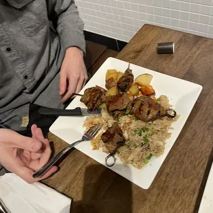 Steak Kabobs served with 2 sides.